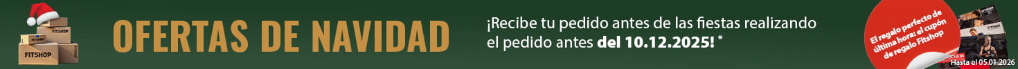 Un banner publicitario navideño con fondo verde y una guirnalda de luces en la parte superior de la imagen. A la izquierda hay varios paquetes con la inscripción «Fitshop». Junto a ellos se muestran varios vales regalo de Fitshop. En un cuadro de texto resaltado en rojo se lee «El regalo perfecto de última hora: el cupón regalo de Fitshop». A la derecha, en mayúsculas, se lee «Ofertas de Navidad» y el añadido «¡Entrega antes de Navidad para pedidos realizados antes del 10/12/2025!»