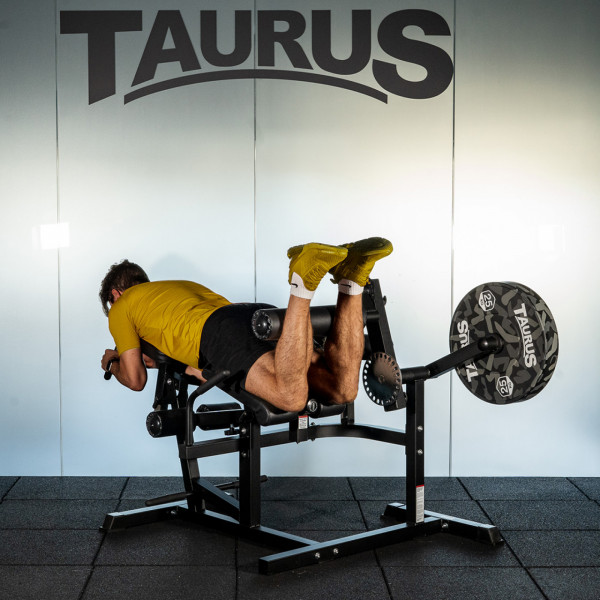 Flexión de piernas tumbado con el multientrenador Taurus 4 en 1